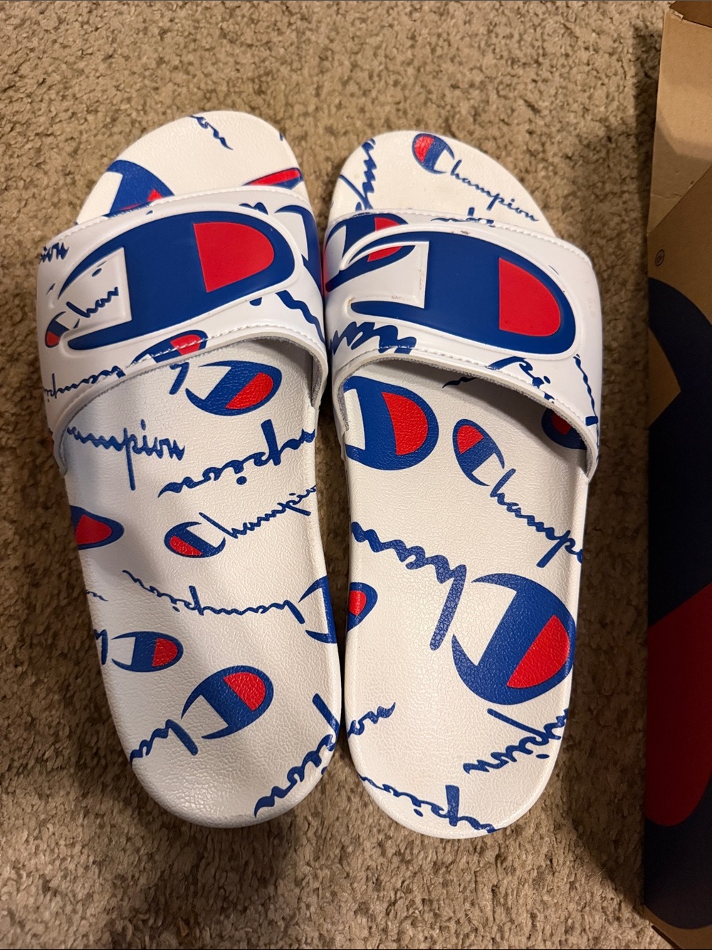 Champion White Slides with Blue and Red Logo Pattern